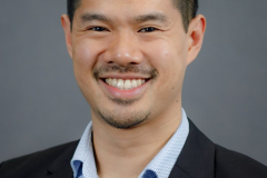 sydney-corporate-headshot-dark-jacket-blue-shirt-matthew-with-a-camera