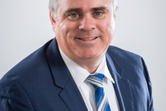 sydney-corporate-portrait-navy-suit-striped-tie-matthew-with-a-camera