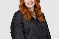 sydney-corporate-portrait-red-hair-black-blouse-matthew-with-a-camera